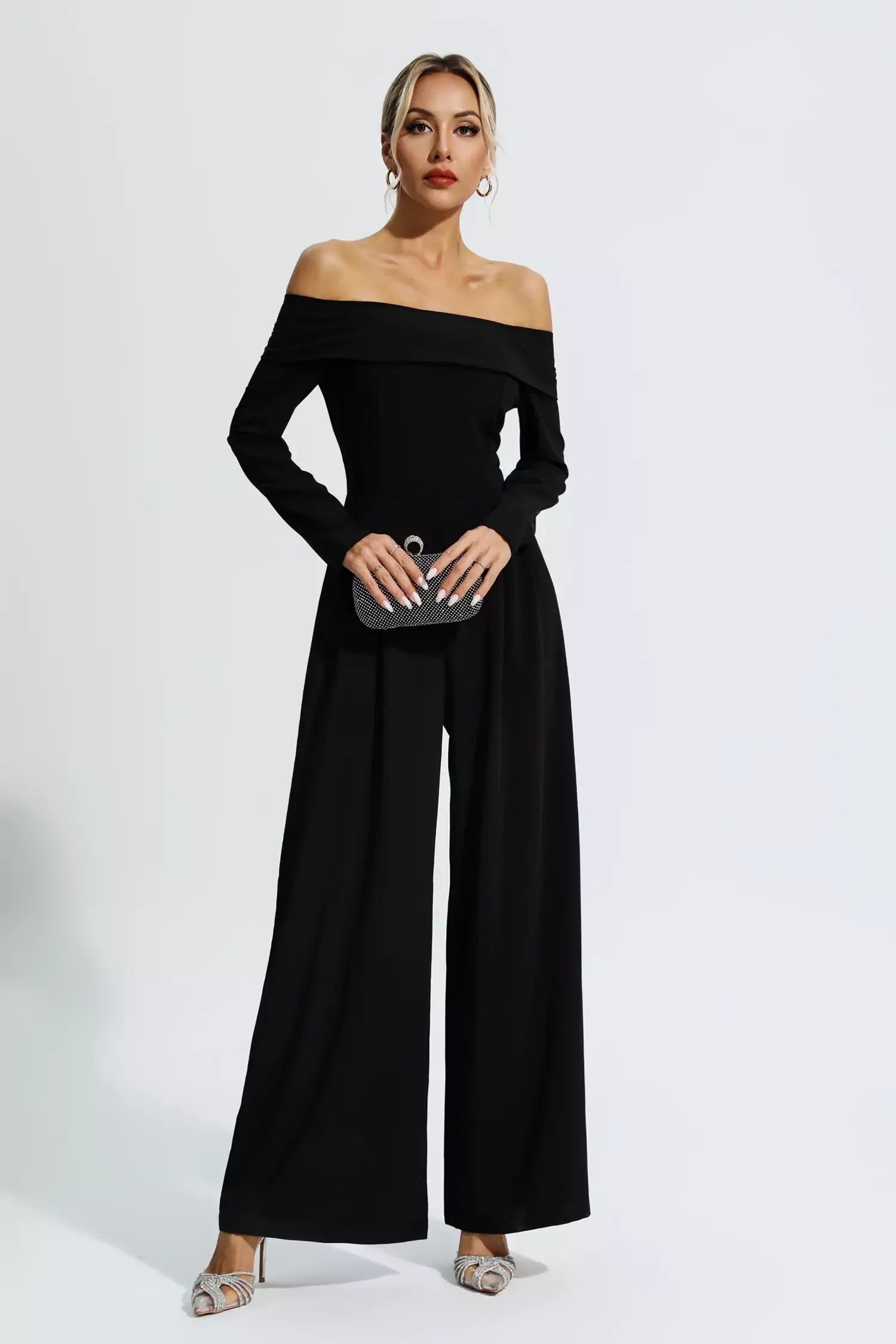 Black Off-Shoulder Drape Jumpsuit by Cassidy