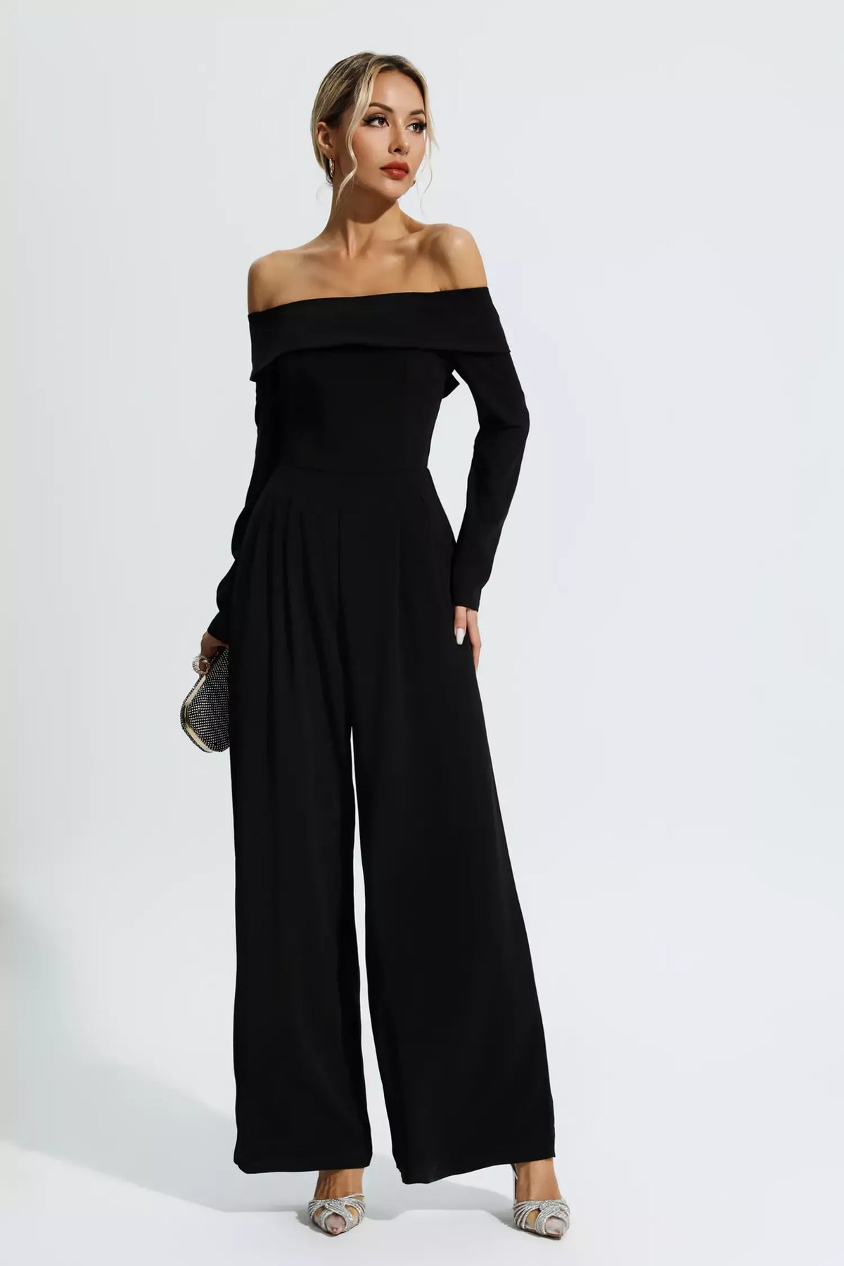 Black Off-Shoulder Drape Jumpsuit by Cassidy