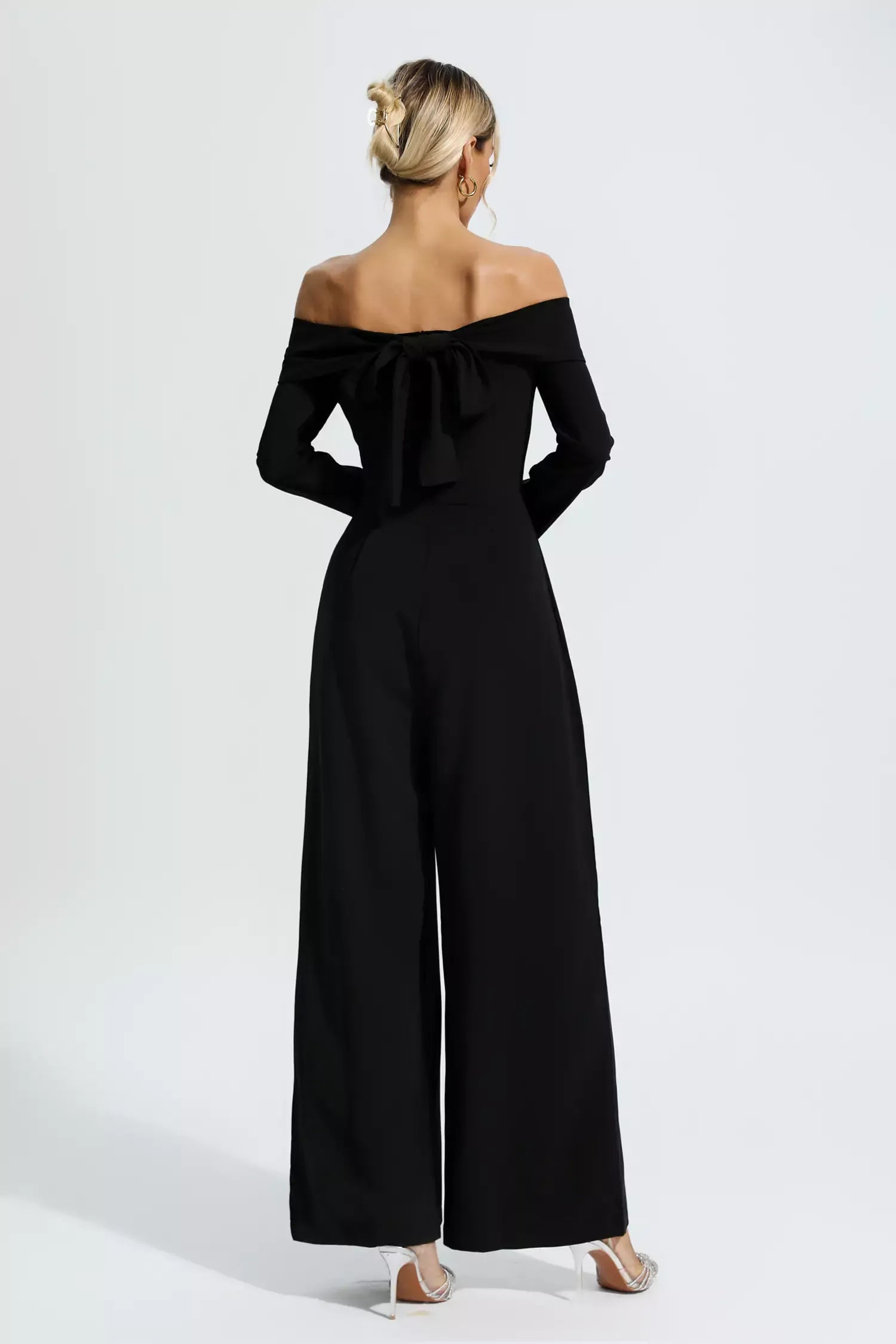 Black Off-Shoulder Drape Jumpsuit by Cassidy